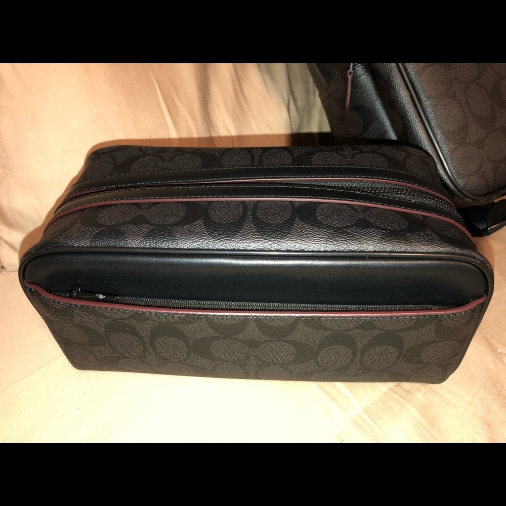 Coach travel accessory kit.